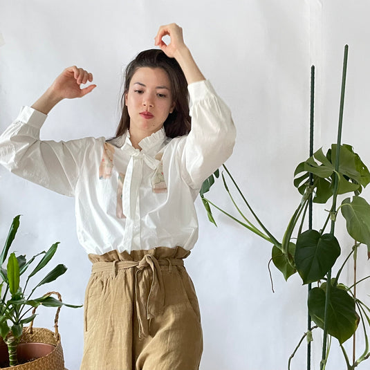 Remi - Ruffle and Ribbon Neck Blouse with Panel Art Print - White