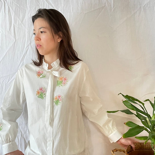 Miley - Ruffle and Ribbon Neck Blouse with Cosmos Flower Print - White