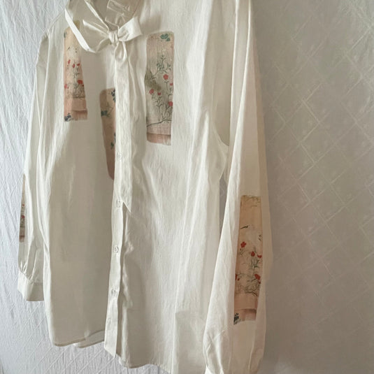 Remi - Ruffle and Ribbon Neck Blouse with Panel Art Print - White